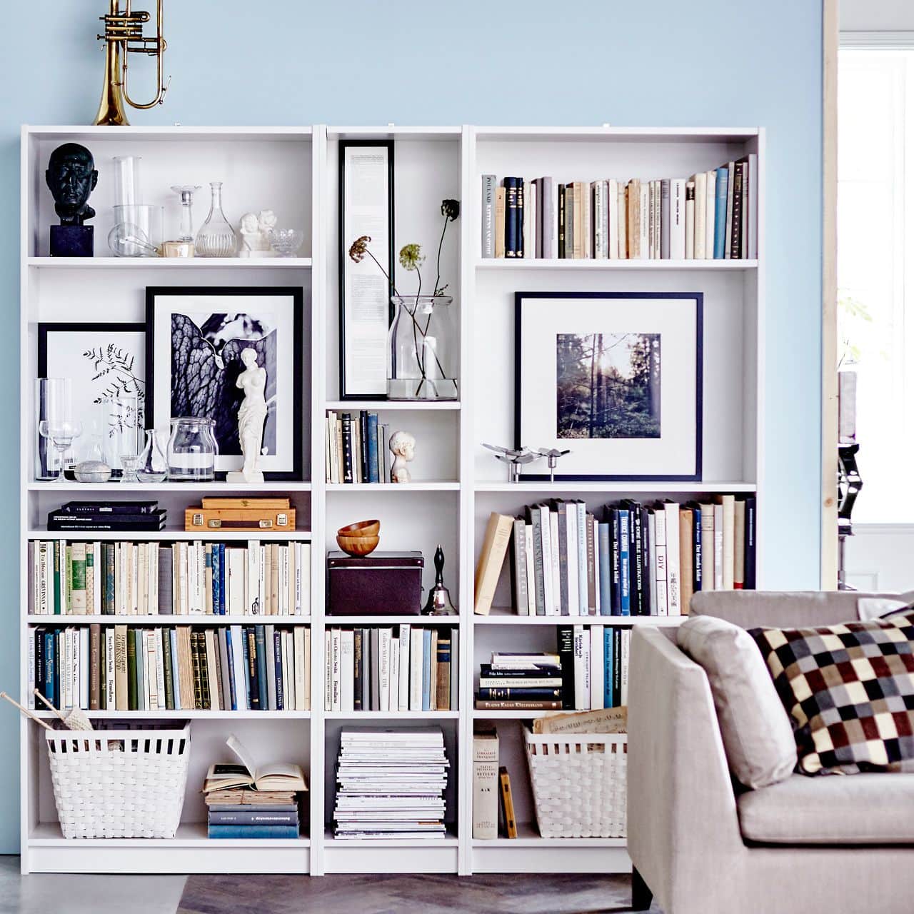 white-ikea-bookshelves-styled-with-books-and-decor